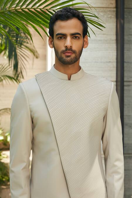 Buy Bohame Ivory Terrycloth Kevin Pintucked Bandhgala And Pant Set Online at Aza Fashions Buy_Bohame_Ivory Terrycloth Kevin Pintucked Bandhgala And Pant Set_Online_at_Aza_Fashions