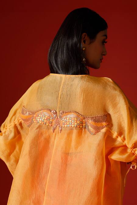 Megha Garg_Orange Organza, Crepe Sequins Halter Neck, Open Hand Embroidered Jacket Pant Set _at_Aza_Fashions