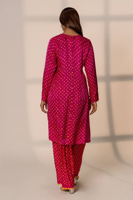 Shop Dyelogue Pink Silk, Gingham V-neck Bandhani Front Slit Tunic With Draped Skirt at Aza Fashions Shop_Dyelogue_Pink Silk, Gingham V-neck Bandhani Front Slit Tunic With Draped Skirt _at_Aza_Fashions