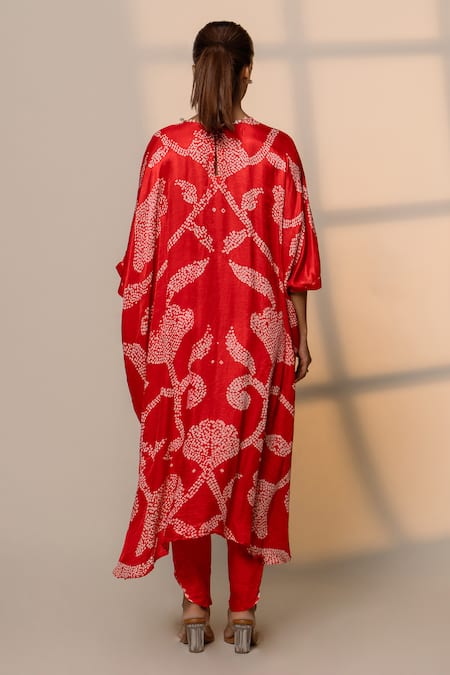 Shop Dyelogue Red Silk Round Neck Ikebana Bandhani Fleur Kurta With Dhoti Pant at Aza Fashions Shop_Dyelogue_Red Silk Round Neck Ikebana Bandhani Fleur Kurta With Dhoti Pant _at_Aza_Fashions