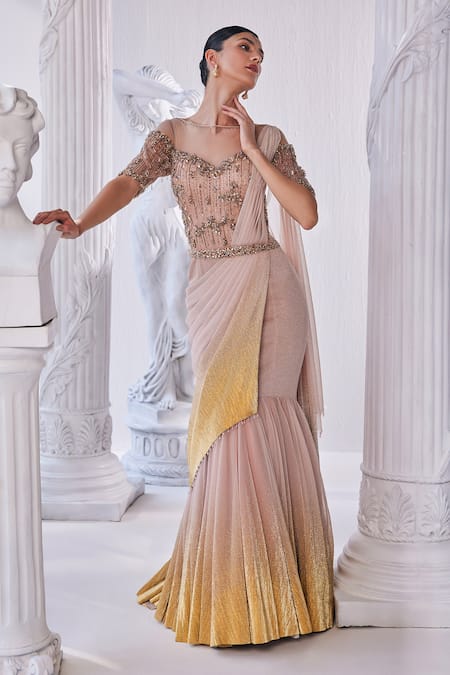 Shop Mandira Wirk - Indian Gold Net, Lycra Beads, Sequins Boat Neck And Peach Embellished Saree Gown Online at Aza Fashions Shop_Mandira Wirk - Indian_Gold Net, Lycra Beads, Sequins Boat Neck And Peach Embellished Saree Gown _Online_at_Aza_Fashions