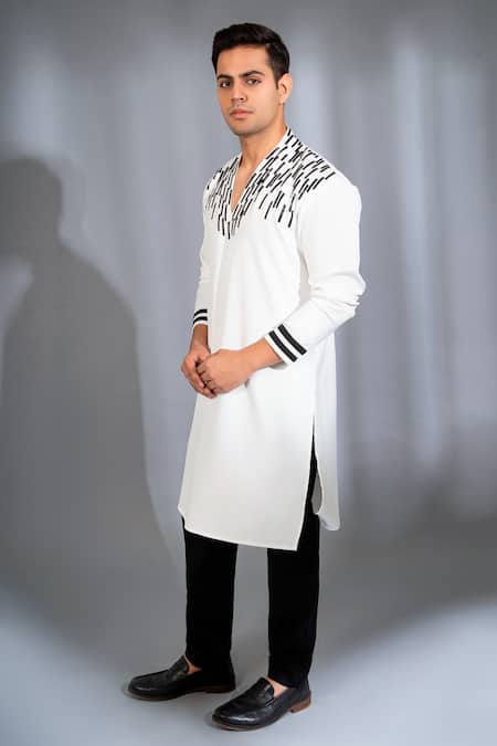 Shop Menero White Chanderi Silk, Crepe Leather Striped V Neck Kurta With Pant at Aza Fashions Shop_Menero_White Chanderi Silk, Crepe Leather Striped V Neck Kurta With Pant _at_Aza_Fashions