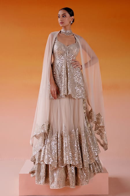 Twenty Nine_Ivory Net, Tissue Mirrors Sweetheart Neck Embellished Tiered Lehenga Set _Online_at_Aza_Fashions