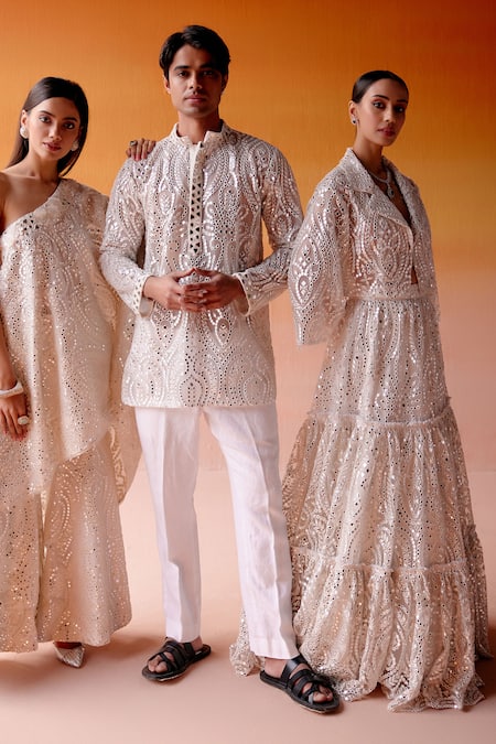 Buy Twenty Nine White Net Mirrors V-neck Three Tiered Embellished Lehenga And Jacket Set Online at Aza Fashions Buy_Twenty Nine_White Net Mirrors V-neck Three Tiered Embellished Lehenga And Jacket Set _Online_at_Aza_Fashions