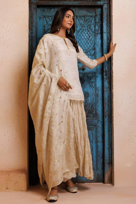 Buy_Geroo Jaipur_Gold Chanderi Embroidery, Mirrors, Gota Patti Embellished Kurta Gharara Set _Online_at_Aza_Fashions