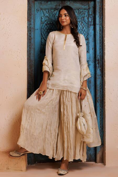 Shop_Geroo Jaipur_Gold Chanderi Embroidery, Mirrors, Gota Patti Embellished Kurta Gharara Set _Online_at_Aza_Fashions