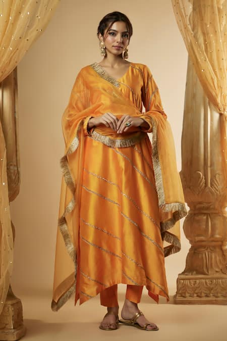 The Aarya Orange Pure Chanderi Silk Embroidered Lace Round Panelled Hand Kurta Set 