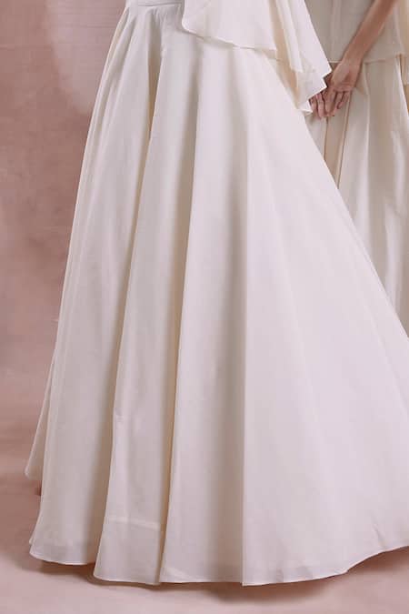 Buy Shwetanga Ivory Cotton Beads, Pearls Halter Neck Beaded Floret Peplum Top With Lehenga Online at Aza Fashions Buy_Shwetanga_Ivory Cotton Beads, Pearls Halter Neck Beaded Floret Peplum Top With Lehenga _Online_at_Aza_Fashions