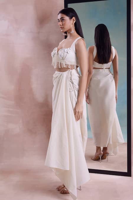 Shop_Shwetanga_Ivory Cotton Pearls, Floret Tassel Embellished Blouse With Draped Wrap Skirt _Online_at_Aza_Fashions