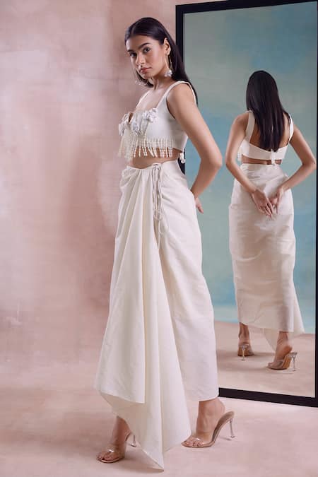 Shwetanga_Ivory Cotton Pearls, Floret Tassel Embellished Blouse With Draped Wrap Skirt _at_Aza_Fashions