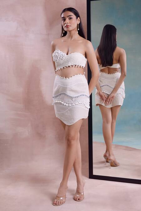 Shwetanga_Ivory Cotton Pearls, Applique, Tassels Wave Mini Skirt With Floret Bustier _Online_at_Aza_Fashions