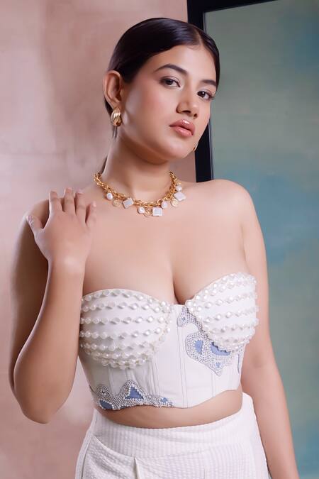 Shwetanga_Ivory Cotton Pearls Off-shoulder Embellished Bustier With Flared Seersucker Pant _Online_at_Aza_Fashions