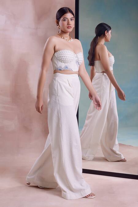 Shop_Shwetanga_Ivory Cotton Pearls Off-shoulder Embellished Bustier With Flared Seersucker Pant _Online_at_Aza_Fashions
