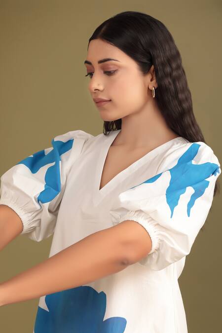 Buy Trendy Tokari White Polyester V-neck Tulip Print A-line Dress Online at Aza Fashions Buy_Trendy Tokari_White Polyester V-neck Tulip Print A-line Dress _Online_at_Aza_Fashions