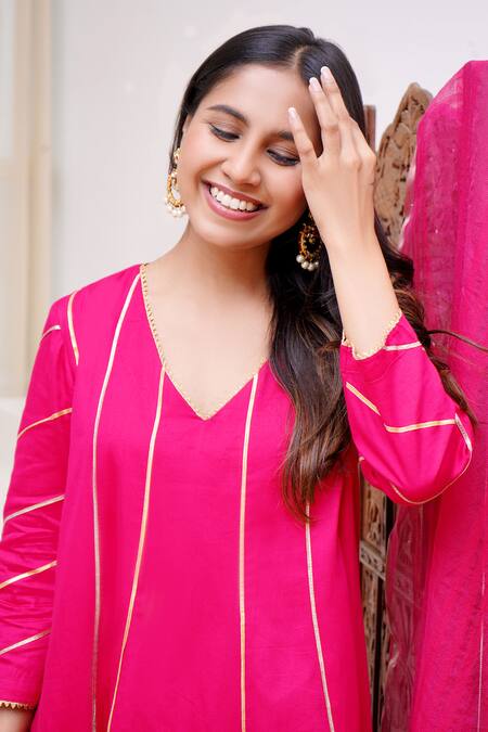 Shop Nero India Fuchsia Cotton Satin Gota Patti V-neck Work Panelled Anarkali And Pant Set Online at Aza Fashions Shop_Nero India_Fuchsia Cotton Satin Gota Patti V-neck Work Panelled Anarkali And Pant Set_Online_at_Aza_Fashions