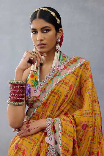 Shop Torani Yellow Muslin, Silk Applique, Mirrors Dil Seher Shrim Floral Print Saree Online at Aza Fashions Shop_Torani_Yellow Muslin, Silk Applique, Mirrors Dil Seher Shrim Floral Print Saree _Online_at_Aza_Fashions