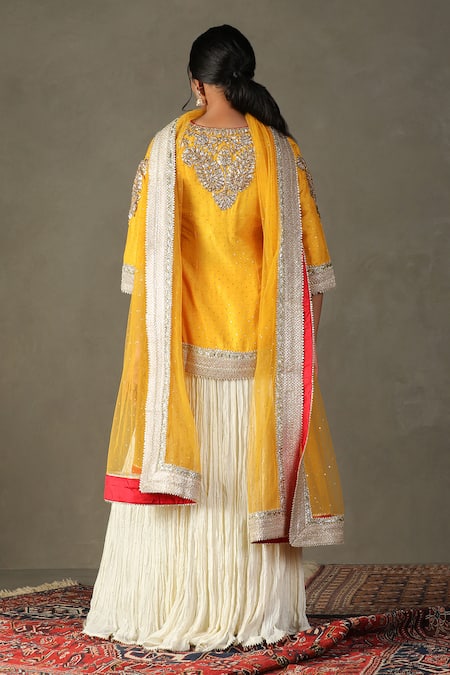 Shop RI.Ritu Kumar Yellow Kurta 100% Silk Embroidered Gota Patti V-neck Bhawani Lehenga Set at Aza Fashions Shop_RI.Ritu Kumar_Yellow Kurta 100% Silk Embroidered Gota Patti V-neck Bhawani Lehenga Set _at_Aza_Fashions