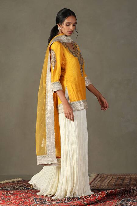 Buy RI.Ritu Kumar Yellow Kurta 100% Silk Embroidered Gota Patti V-neck Bhawani Lehenga Set Online at Aza Fashions Buy_RI.Ritu Kumar_Yellow Kurta 100% Silk Embroidered Gota Patti V-neck Bhawani Lehenga Set _Online_at_Aza_Fashions