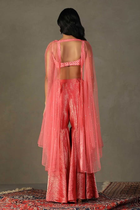 Shop RI.Ritu Kumar Pink Blouse Shell 100% Silk Embroidery Sequin Cape Open Darpan Gharara Set at Aza Fashions Shop_RI.Ritu Kumar_Pink Blouse Shell 100% Silk Embroidery Sequin Cape Open Darpan Gharara Set _at_Aza_Fashions