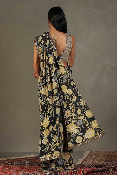 Shop RI.Ritu Kumar Black Saree - 100% Silk Print Floral V Neck Janet With Blouse at Aza Fashions Shop_RI.Ritu Kumar_Black Saree - 100% Silk Print Floral V Neck Janet With Blouse_at_Aza_Fashions