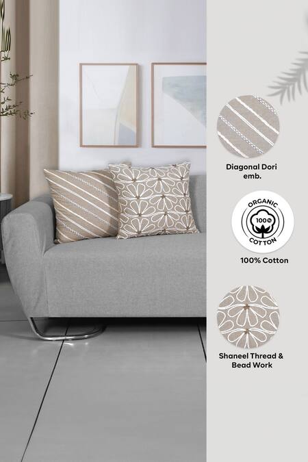 Shop Ode & Cloe Off White Cotton Embroidered, Shaneel Thread, And Floral 5 Pcs Cushion Covers at Aza Fashions Shop_Ode & Cloe_Off White Cotton Embroidered, Shaneel Thread, And Floral 5 Pcs Cushion Covers_at_Aza_Fashions
