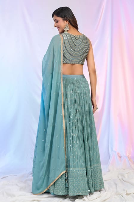 Ariyana By Aza Blue Silk, Net, Georgette Sequins, Tassels V-neck Hand Work Pleated Lehenga Set Online at Aza Fashions Ariyana By Aza_Blue Silk, Net, Georgette Sequins, Tassels V-neck Hand Work Pleated Lehenga Set _Online_at_Aza_Fashions