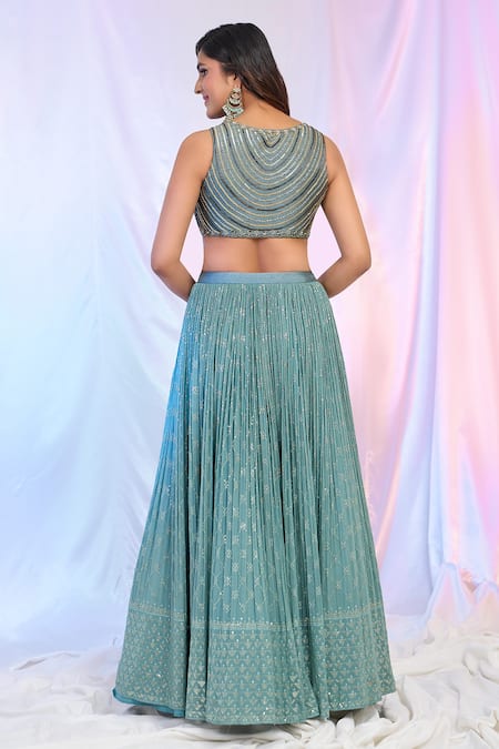 Shop Ariyana By Aza Blue Silk, Net, Georgette Sequins, Tassels V-neck Hand Work Pleated Lehenga Set Online at Aza Fashions Shop_Ariyana By Aza_Blue Silk, Net, Georgette Sequins, Tassels V-neck Hand Work Pleated Lehenga Set _Online_at_Aza_Fashions