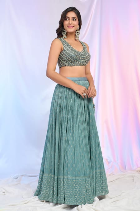 Ariyana By Aza Blue Silk, Net, Georgette Sequins, Tassels V-neck Hand Work Pleated Lehenga Set at Aza Fashions Ariyana By Aza_Blue Silk, Net, Georgette Sequins, Tassels V-neck Hand Work Pleated Lehenga Set _at_Aza_Fashions