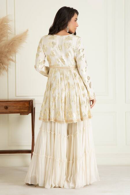 Shop Priyanka Jain Ivory Lurex, Georgette, Cotton Sequins, Embroidered Peplum Kurta Sharara Set at Aza Fashions Shop_Priyanka Jain_Ivory Lurex, Georgette, Cotton Sequins, Embroidered Peplum Kurta Sharara Set_at_Aza_Fashions