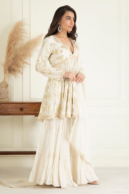 Buy Priyanka Jain Ivory Lurex, Georgette, Cotton Sequins, Embroidered Peplum Kurta Sharara Set Online at Aza Fashions Buy_Priyanka Jain_Ivory Lurex, Georgette, Cotton Sequins, Embroidered Peplum Kurta Sharara Set_Online_at_Aza_Fashions