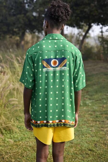 Shop Triune Green Rayon Club Bali And Sun Print Lapel Collar Shirt at Aza Fashions Shop_Triune_Green Rayon Club Bali And Sun Print Lapel Collar Shirt_at_Aza_Fashions
