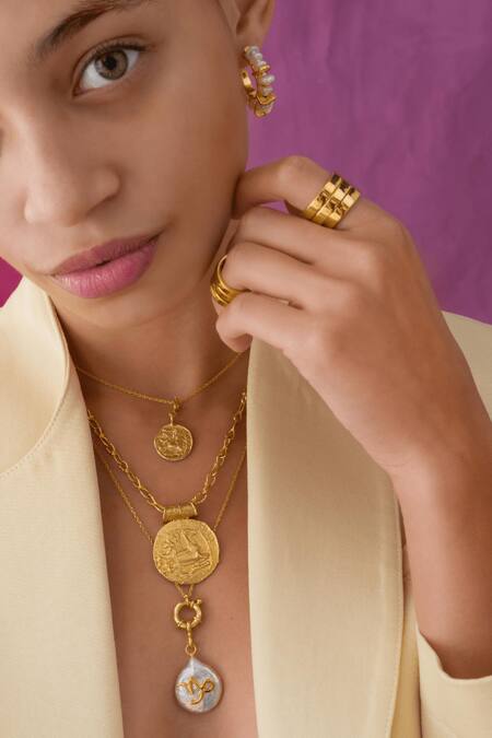 Shop Misho Gold Plated Capricorn Pearl Convertible Pendant Necklace at Aza Fashions Shop_Misho_Gold Plated Capricorn Pearl Convertible Pendant Necklace_at_Aza_Fashions