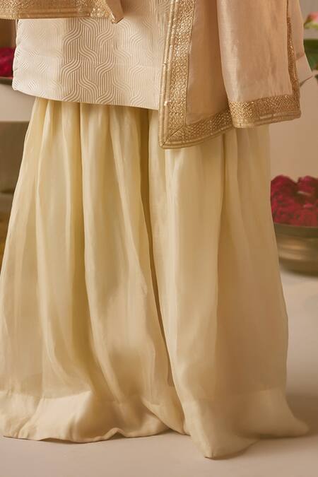 Shop_Shorshe Clothing_Ivory Brocade, Tissue Zari, Embroidery V-neck Anu Banarasi Kurta And Sharara Set_Online_at_Aza_Fashions