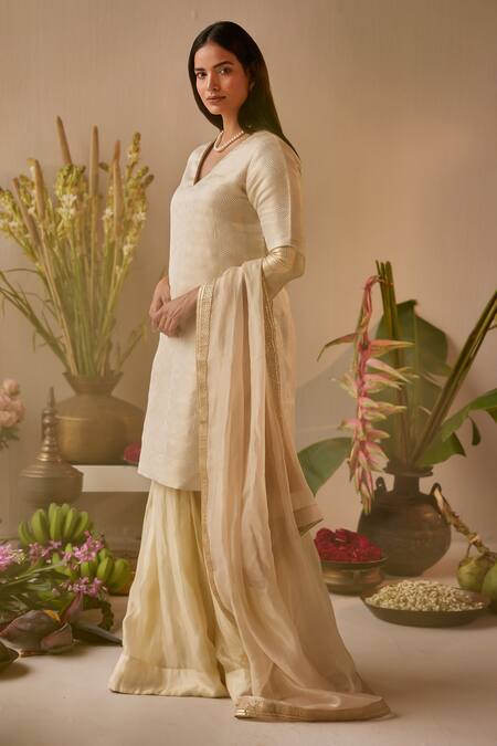 Shorshe Clothing_Ivory Brocade, Tissue Zari, Embroidery V-neck Anu Banarasi Kurta And Sharara Set_at_Aza_Fashions
