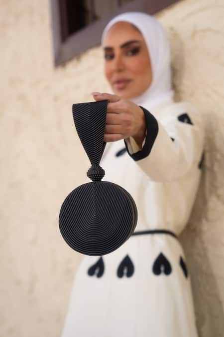 Shop_Ampm_Black Reeza Circular Structured Wristlet 