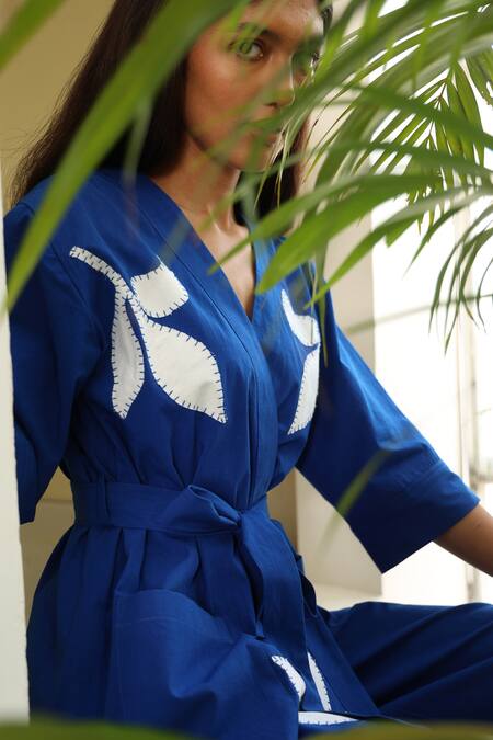 Kanelle_Blue Cotton Applique V-neck Everly Floral Embroidered Wrap Top And Trouser Set_at_Aza_Fashions