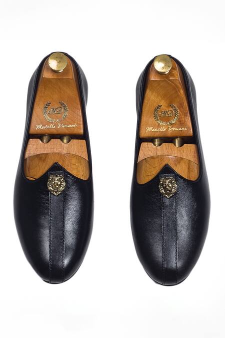 Shop Domani Black Leather Juttis With Lion Buckle at Aza Fashions Shop_Domani_Black Leather Juttis With Lion Buckle _at_Aza_Fashions