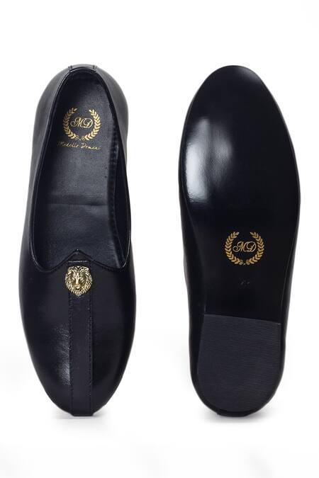 Buy Domani Black Leather Juttis With Lion Buckle Online at Aza Fashions Buy_Domani_Black Leather Juttis With Lion Buckle _Online_at_Aza_Fashions