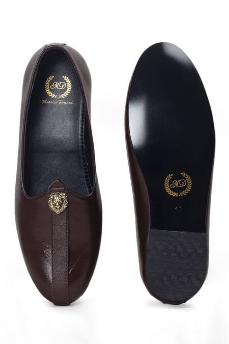 Buy Domani Brown Leather Juttis With Lion Buckle Online at Aza Fashions Buy_Domani_Brown Leather Juttis With Lion Buckle _Online_at_Aza_Fashions