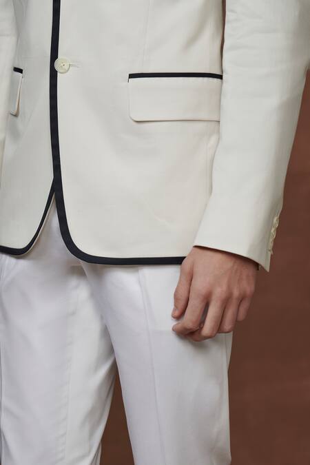 Raghavendra Rathore Jodhpur Cream Cotton Contrast Border Lapel Collar Tuxedo Jacket Online at Aza Fashions Raghavendra Rathore Jodhpur_Cream Cotton Contrast Border Lapel Collar Tuxedo Jacket _Online_at_Aza_Fashions