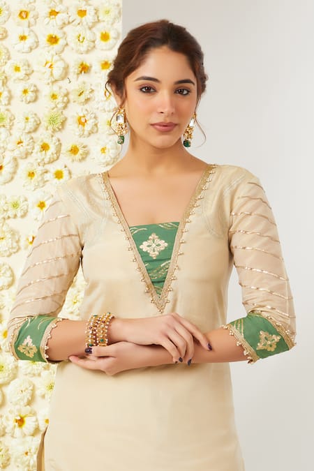 Tashee_Beige Tissue, Chanderi Embroidery V-neck Floral Work Kurta Pant Set _at_Aza_Fashions