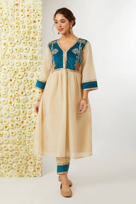Buy_Tashee_Beige Velvet, Tissue, Organza Embroidery V-neck Floral Kurta Pant Set _Online_at_Aza_Fashions