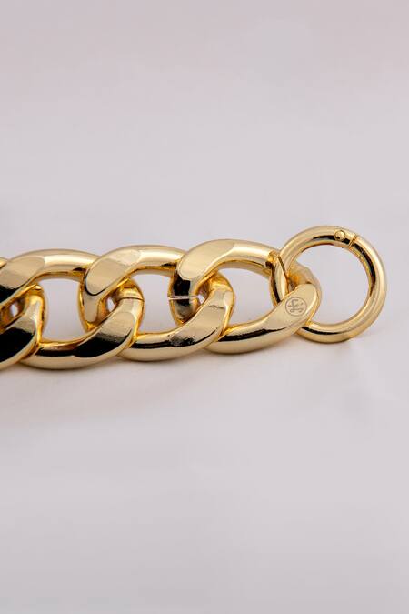 Buy_Saurav Ghosh_Gold Brooches Laxmi Carved Clutch_Online_at_Aza_Fashions