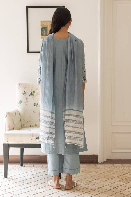 Shop Vaayu Blue Muslin, Cotton Cut Work, Tassels Round Floral Thread Embroidered Kurta Set at Aza Fashions Shop_Vaayu_Blue Muslin, Cotton Cut Work, Tassels Round Floral Thread Embroidered Kurta Set _at_Aza_Fashions