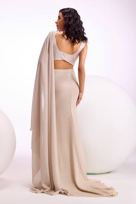 Shop Namrata Joshipura Cream Shimmer Chiffon Hand Embellished Zenobia Pre-draped Saree With Blouse at Aza Fashions Shop_Namrata Joshipura_Cream Shimmer Chiffon Hand Embellished Zenobia Pre-draped Saree With Blouse_at_Aza_Fashions