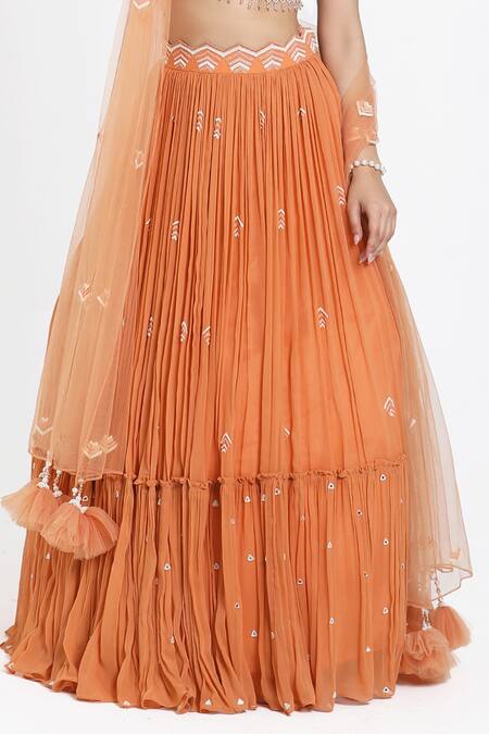 Nitisha Kashyap Official_Peach Silk, Net, Georgette Cut Work, Beads, Hand Embroidered Blouse Lehenga Set _Online_at_Aza_Fashions