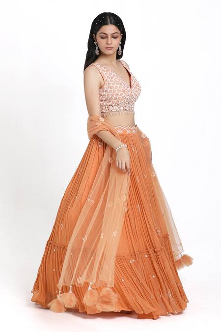 Buy_Nitisha Kashyap Official_Peach Silk, Net, Georgette Cut Work, Beads, Hand Embroidered Blouse Lehenga Set _Online_at_Aza_Fashions