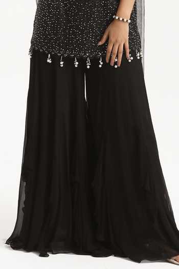 Buy Nitisha Kashyap Black Silk, Net, Georgette Sequins, Beads Halter Embroidered Kurta Sharara Set Online at Aza Fashions Buy_Nitisha Kashyap_Black Silk, Net, Georgette Sequins, Beads Halter Embroidered Kurta Sharara Set _Online_at_Aza_Fashions