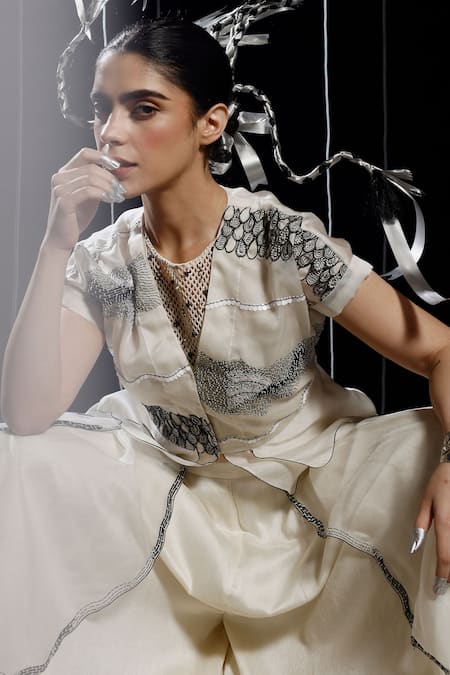 Eclat By Prerika Jalan_Ivory Organza, Satin, Muslin Knot Celeste Embroidered Peplum Jacket Palazzo Set _at_Aza_Fashions