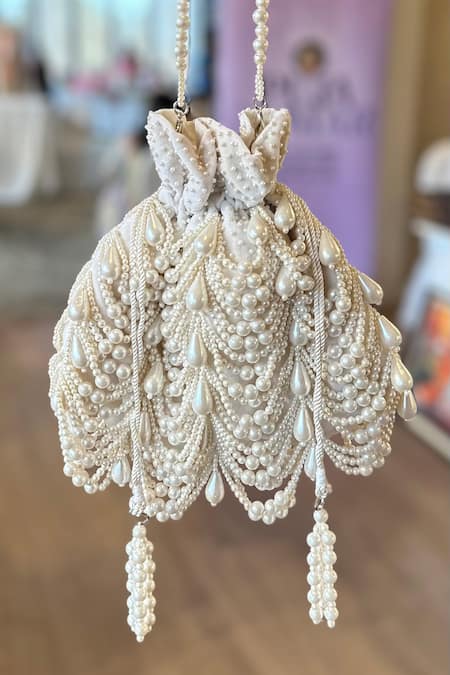 Shop House Of Kosha Ivory Pearls Farah Embellished Potli Bag at Aza Fashions Shop_House Of Kosha_Ivory Pearls Farah Embellished Potli Bag _at_Aza_Fashions